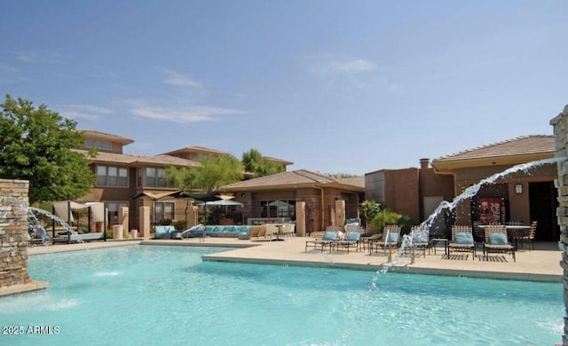 view of pool featuring pool water feature