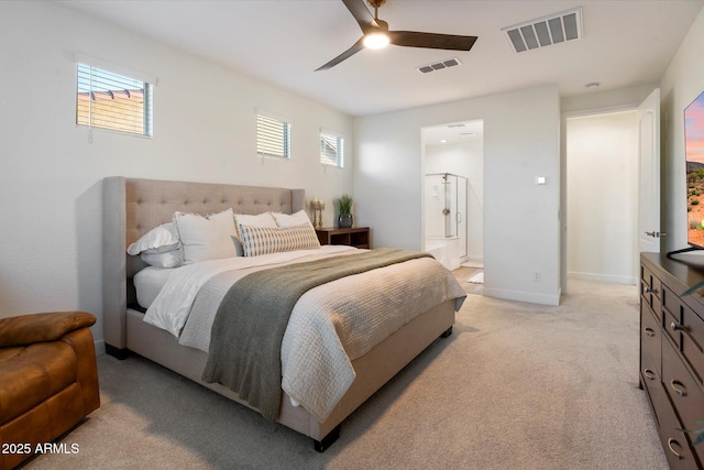 5661 S Dante, Mesa, AZ 85212 - bedroom with light colored carpet, ceiling fan, connected bathroom, and baseboards