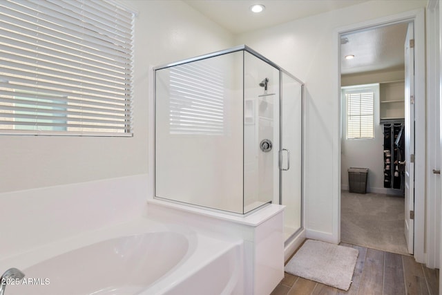 5661 S Dante, Mesa, AZ 85212 - full bath with a stall shower, a bath, wood finished floors, and recessed lighting