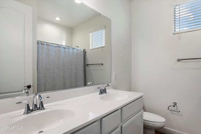 5661 S Dante, Mesa, AZ 85212 - full bathroom with double vanity, toilet, recessed lighting, and a shower with shower curtain