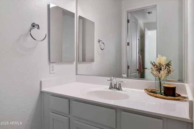 5661 S Dante, Mesa, AZ 85212 - bathroom with vanity and a textured wall