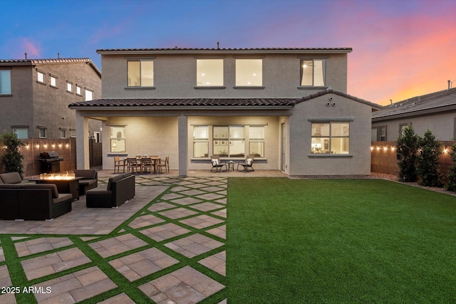5661 S Dante, Mesa, AZ 85212 - rear view of house featuring an outdoor living space with a fire pit, a patio, stucco siding, and a tiled roof