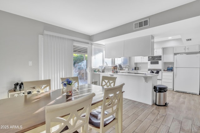 dining space with sink