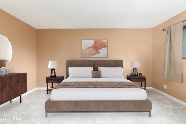 bedroom featuring light colored carpet