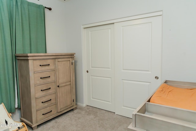 14344 W Hackamore Dr, Surprise, AZ 85387 - bedroom featuring light colored carpet and a closet