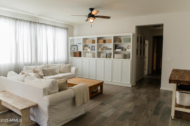 14344 W Hackamore Dr, Surprise, AZ 85387 - living area featuring a ceiling fan and dark wood-type flooring