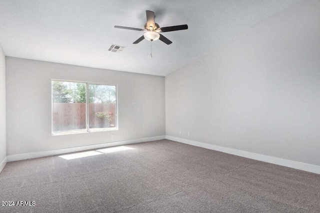 spare room with carpet floors and ceiling fan