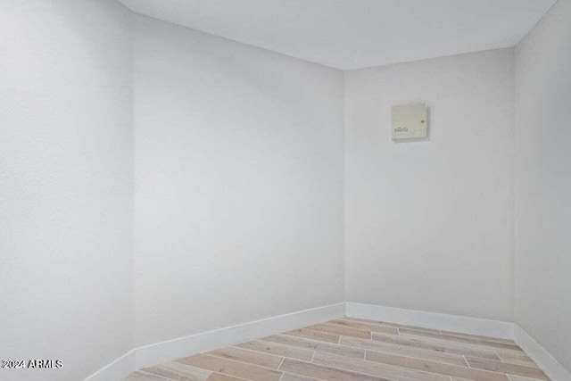 empty room featuring light hardwood / wood-style floors