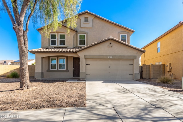 view of front of property featuring a garage