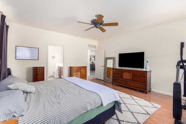 bedroom with ceiling fan and light hardwood / wood-style floors