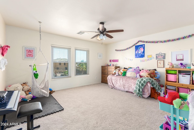 bedroom with ceiling fan and carpet