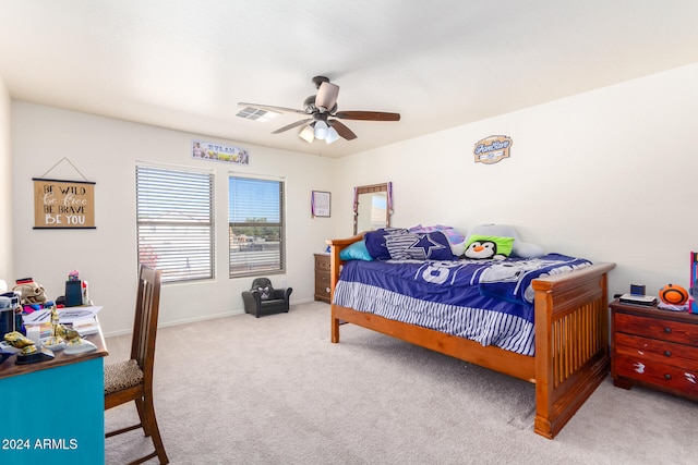 carpeted bedroom with ceiling fan