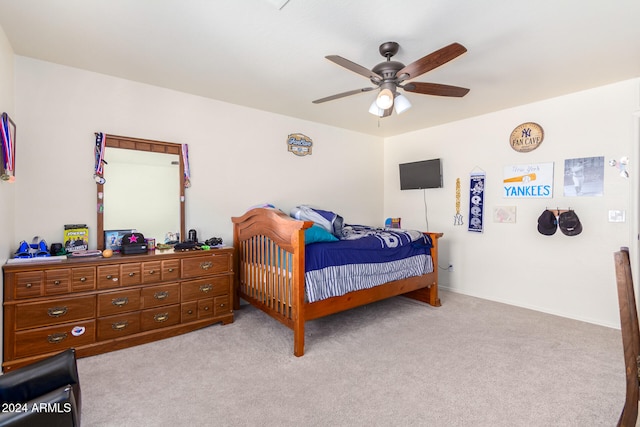 bedroom featuring ceiling fan and light colored carpet