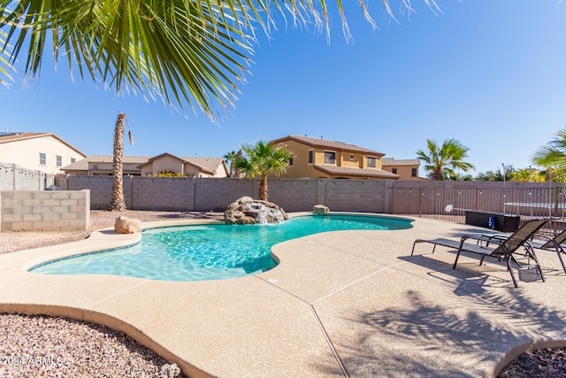 view of pool featuring a patio