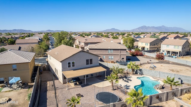 birds eye view of property featuring a mountain view