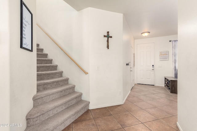 view of tiled foyer entrance