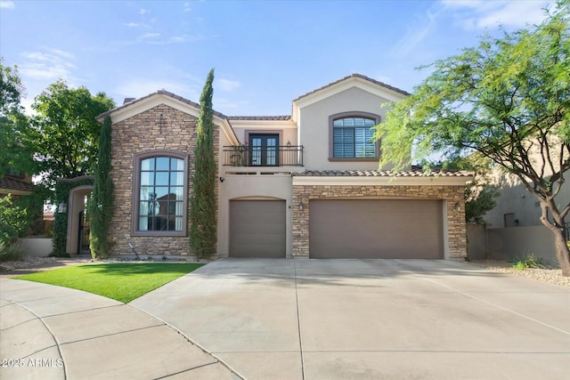 mediterranean / spanish house featuring a garage