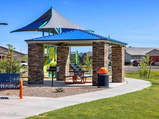 view of property's community featuring playground community