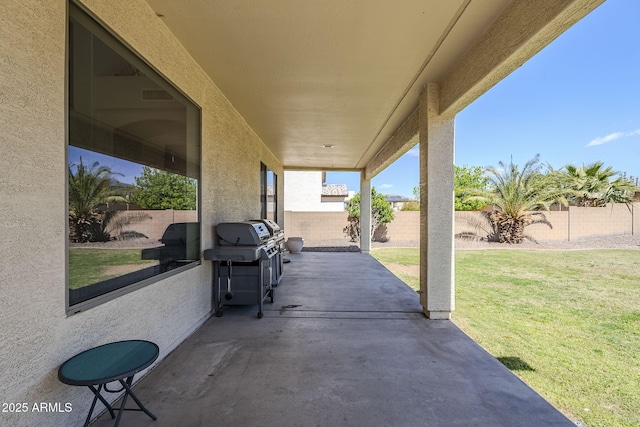 view of patio featuring a grill, visible vents, and a fenced backyard