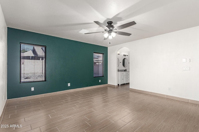 spare room featuring ceiling fan