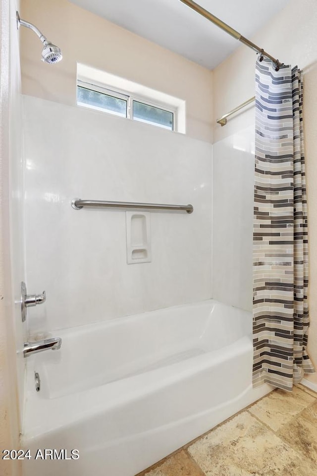 bathroom featuring shower / bath combo