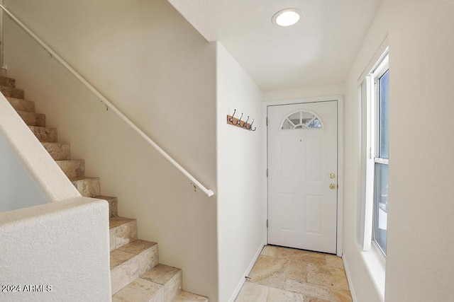 entrance foyer featuring a wealth of natural light