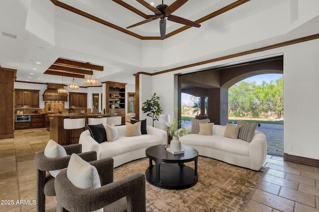 14760 E Paradise Dr, Fountain Hills, AZ 85268 - living room with ceiling fan, baseboards, ornamental molding, recessed lighting, and beamed ceiling