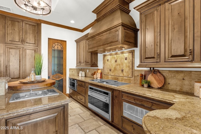 14760 E Paradise Dr, Fountain Hills, AZ 85268 - kitchen with oven, stovetop with downdraft, a sink, premium range hood, and decorative backsplash