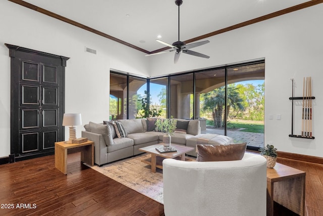 14760 E Paradise Dr, Fountain Hills, AZ 85268 - living room featuring crown molding, ceiling fan, wood finished floors, plenty of natural light, and baseboards
