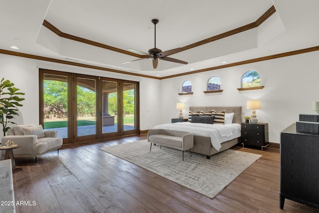 14760 E Paradise Dr, Fountain Hills, AZ 85268 - bedroom with a tray ceiling, access to outside, hardwood / wood-style floors, recessed lighting, and ornamental molding