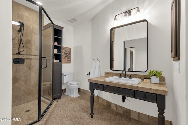 14760 E Paradise Dr, Fountain Hills, AZ 85268 - full bathroom with toilet, a stall shower, vanity, and tile patterned floors