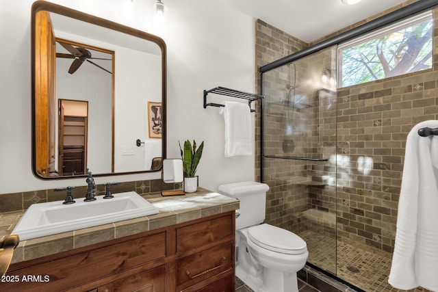 14760 E Paradise Dr, Fountain Hills, AZ 85268 - full bath featuring a ceiling fan, a shower stall, vanity, and toilet
