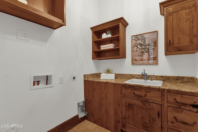 14760 E Paradise Dr, Fountain Hills, AZ 85268 - washroom with hookup for an electric dryer, washer hookup, cabinet space, and baseboards