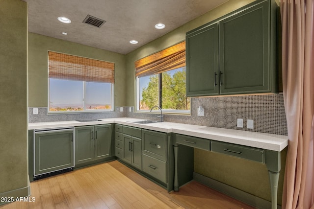 14760 E Paradise Dr, Fountain Hills, AZ 85268 - kitchen featuring green cabinets, a sink, light countertops, light wood finished floors, and recessed lighting