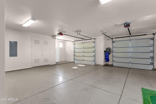 14760 E Paradise Dr, Fountain Hills, AZ 85268 - garage with electric panel, a garage door opener, and baseboards
