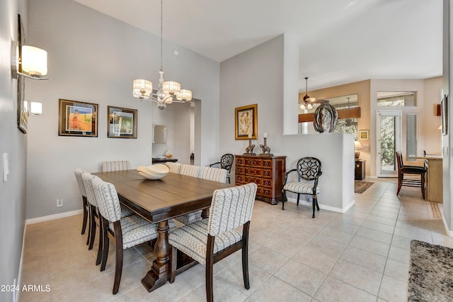 dining area with light tile patterned floors and ceiling fan