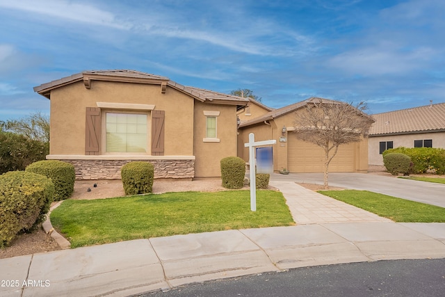 view of front of property with a garage, concrete driveway, stone siding, and stucco siding