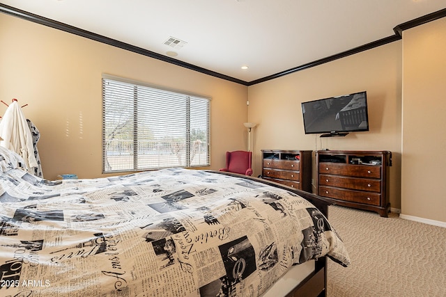 carpeted bedroom with visible vents, ornamental molding, and baseboards