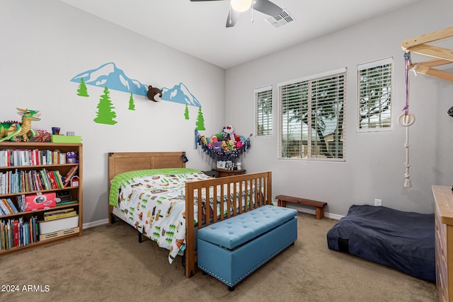 carpeted bedroom with ceiling fan