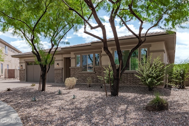 view of front of property with a garage