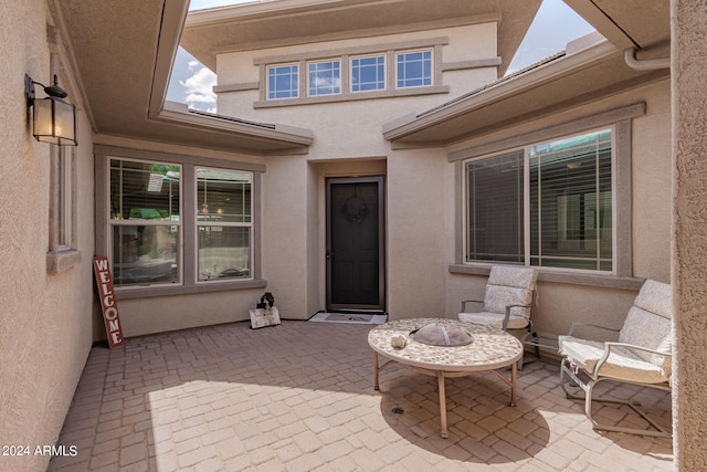 view of patio with a fire pit