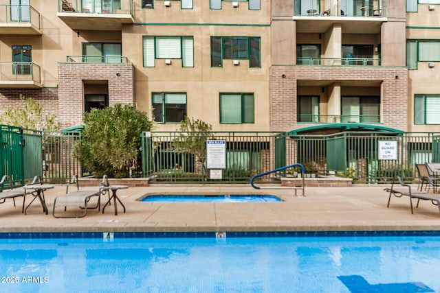 2302 N Central Ave Unit 206, Phoenix, AZ 85004 - community pool featuring a patio