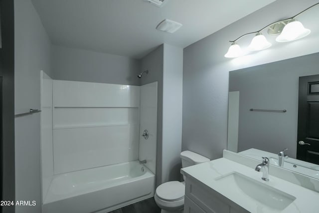 full bathroom with vanity, bathing tub / shower combination, and toilet