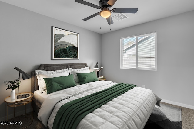 bedroom featuring ceiling fan and carpet flooring