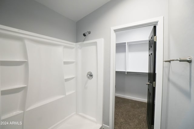 bathroom featuring a shower