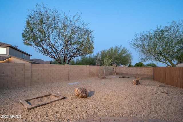 view of yard featuring a fenced backyard