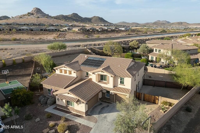 drone / aerial view with a mountain view and a residential view