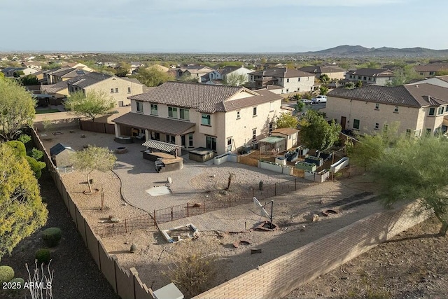 aerial view with a mountain view and a residential view