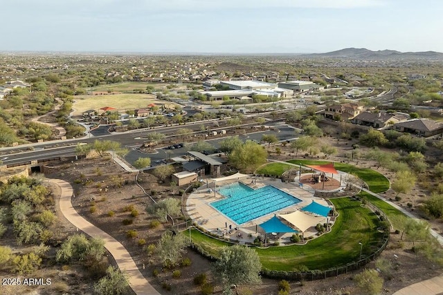 drone / aerial view featuring a mountain view