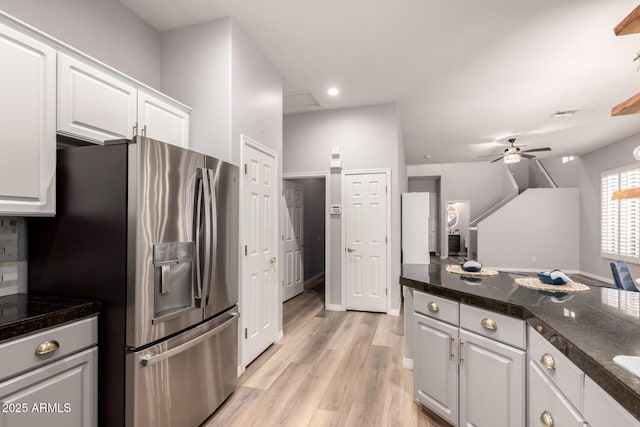 1925 W Olive Way, Chandler, AZ 85248 - kitchen with stainless steel fridge, white cabinets, light wood-style flooring, ceiling fan, and tile countertops
